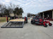 Ferris 5902144 42" 300S Zero Turn Mower Util Trailer Bundle left side view picture with ramp down