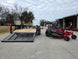 Ferris 5902144 42" 300S Zero Turn Mower Util Trailer Bundle left side view picture with ramp down