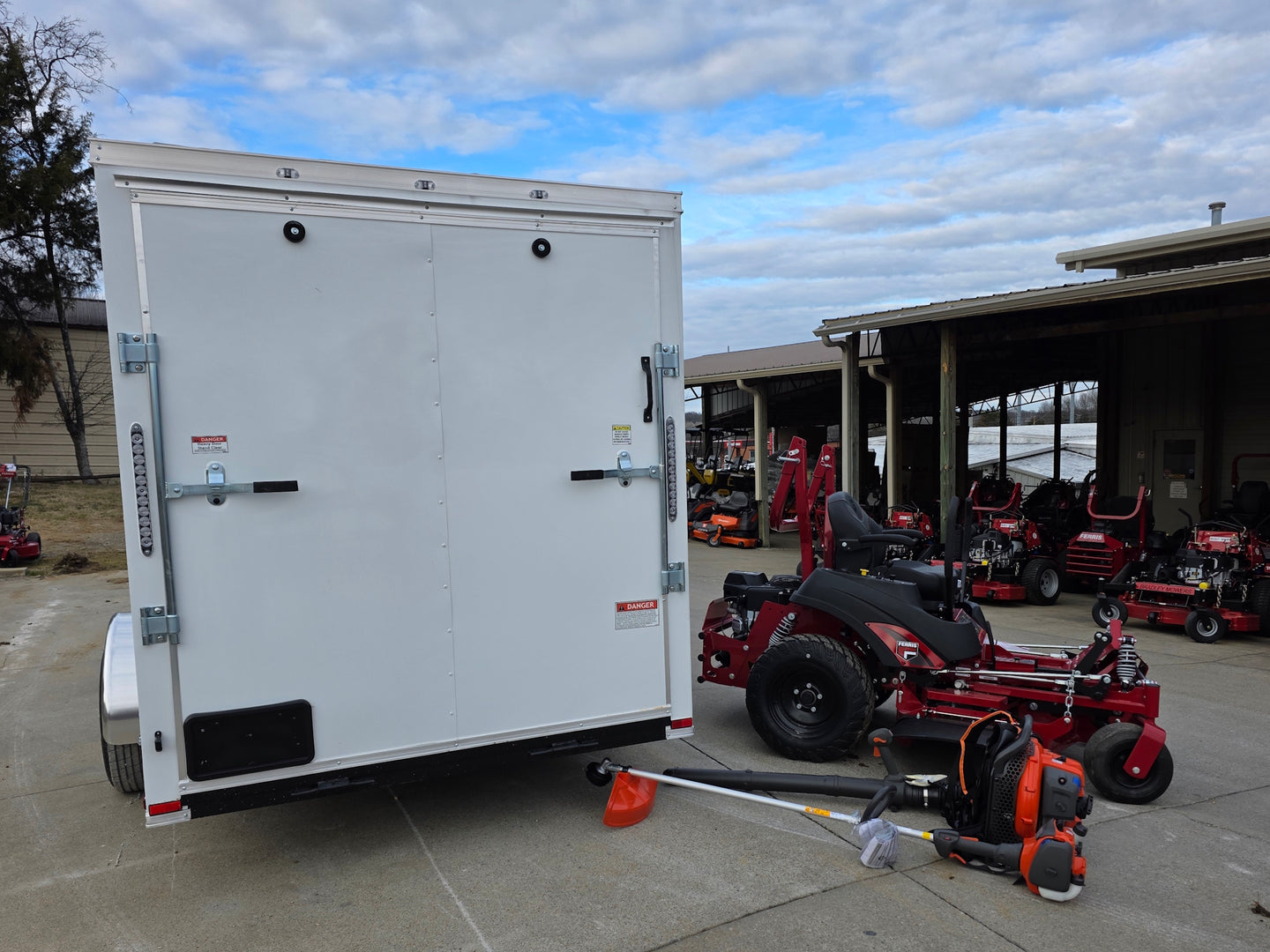 Ferris 5902154 52" ISX800 Commercial Zero Turn Mower Encl Trailer Handheld Bundle back angled view picture 
