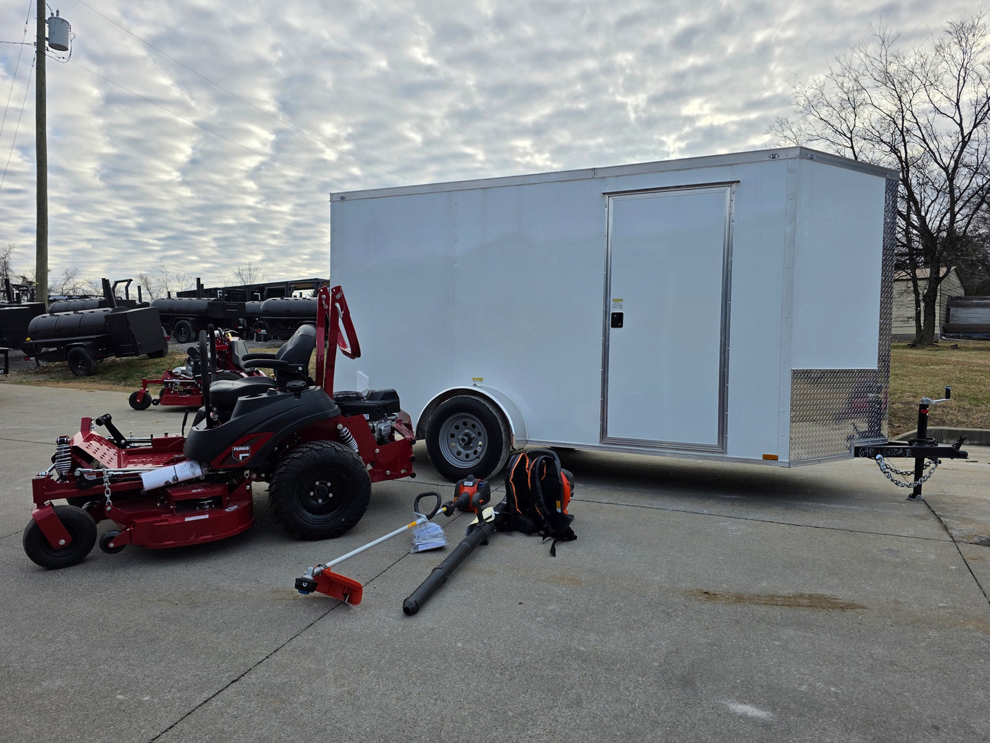 Ferris 5902154 52" ISX800 Commercial Zero Turn Mower Encl Trailer Handheld Bundle right angled view picture 
