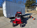 Ferris SRS Z1 36" 19HP 5901939 Kawasaki Stand-On Mower Handhelds Enclosed Trailer Bundle left angled view picture 