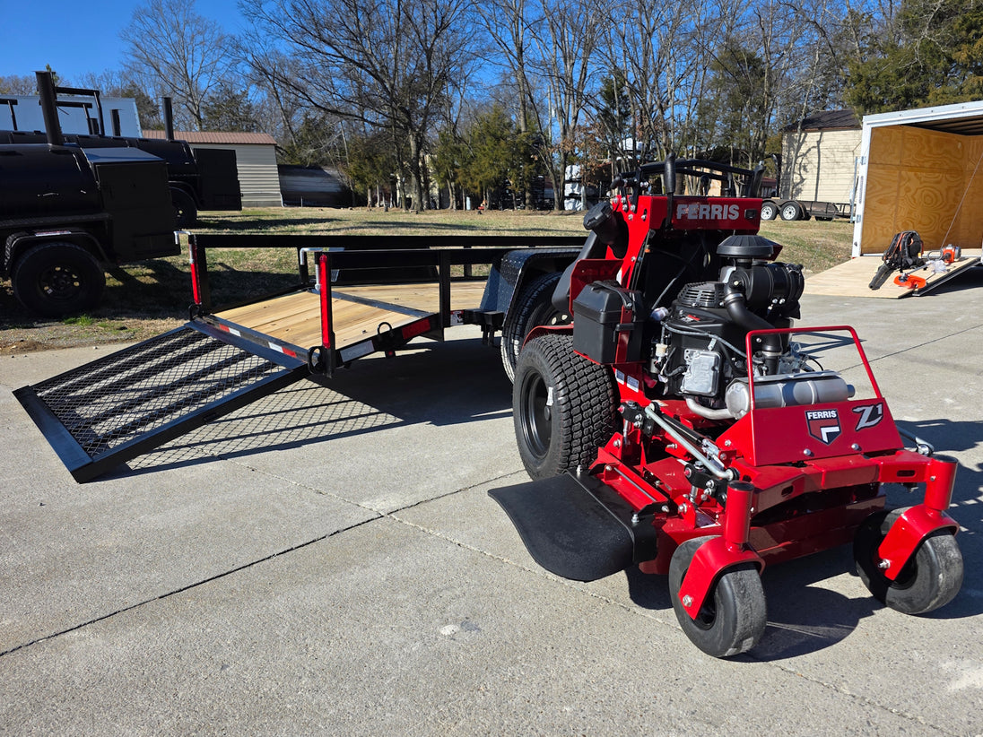 Ferris SRS Z1 36" 19HP Kawasaki 5901939 Stand-On Mower 5x10 Utility Trailer Package (Instant Rebate Included) left angled view with ramp down picture