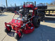 Ferris SRS Z1 36" 19HP Kawasaki 5901939 Stand-On Mower 5x10 Utility Trailer Package (Instant Rebate Included) right side mower with trailer background view picture 