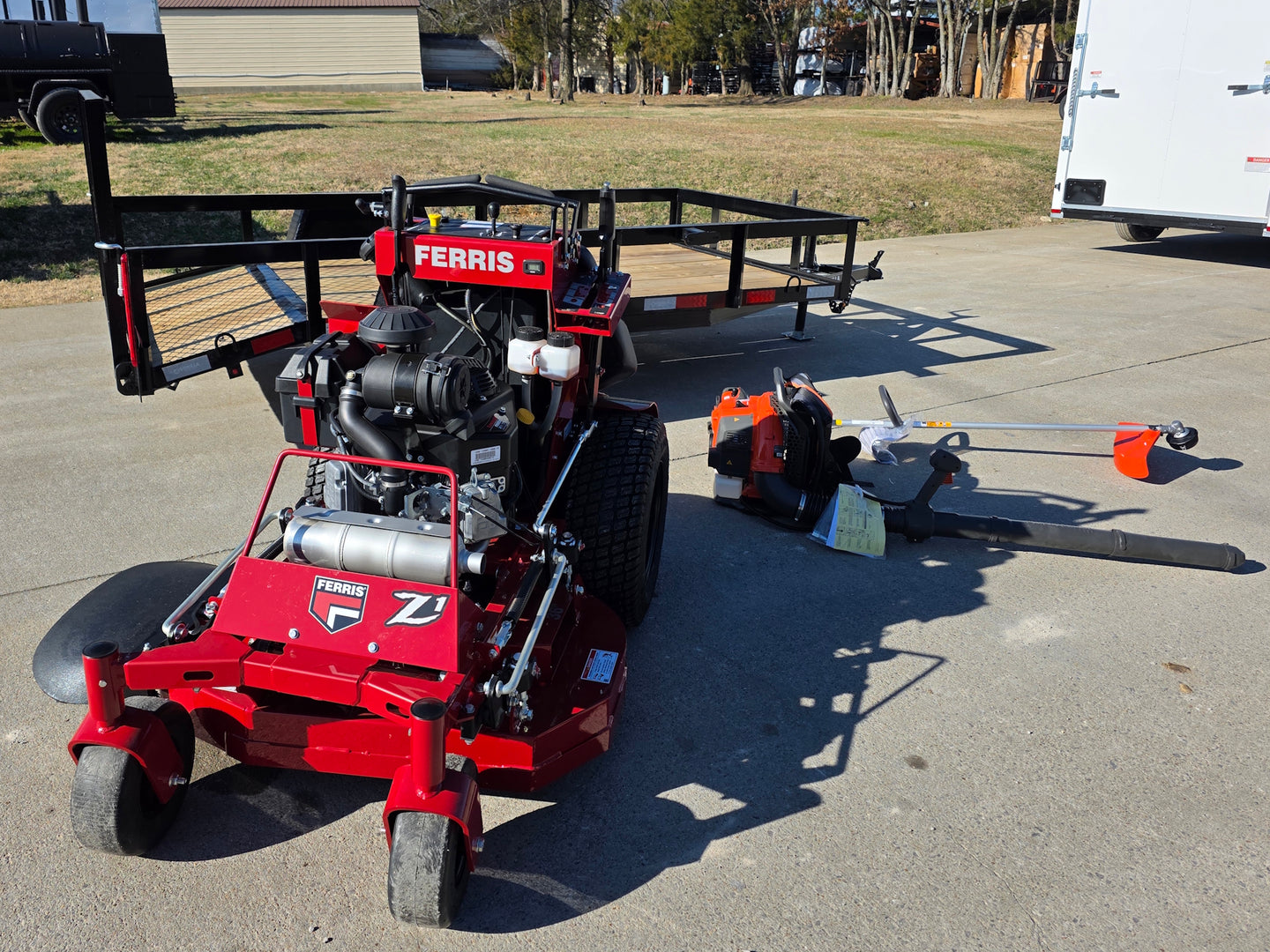 Ferris SRS Z1 5901939 36" Stand-On Mower Handhelds Util Trailer Bundle front angled view picture 