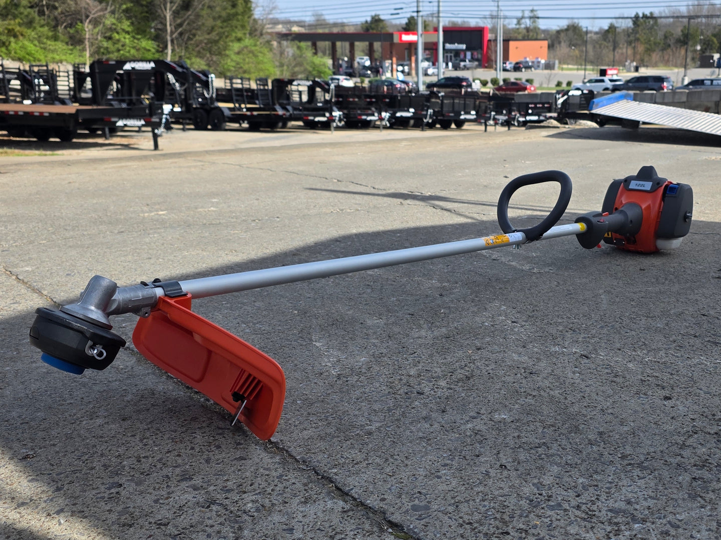 Husqvarna 122L Gas Straight Shaft String Trimmer 22cc Engine (Unboxed) Front right angle picture 