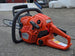 Husqvarna 130 Gas Powered 16" Chainsaw .050 Gauge - Bar & Chain Included (Unboxed) Back left angle picture 