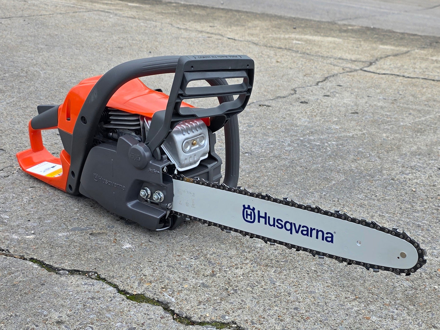 Husqvarna 130 Gas Powered 16" Chainsaw .050 Gauge - Bar & Chain Included (Unboxed) Front left angle picture 