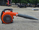 Husqvarna 525BX Handheld Commercial Leaf Blower X-Torq Low Vib (Unboxed) Attachment A left side picture 