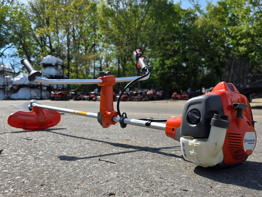 Husqvarna 525RX Commerical Brushcutter 25.4cc Engine Bike Handle Front back left angle picture.