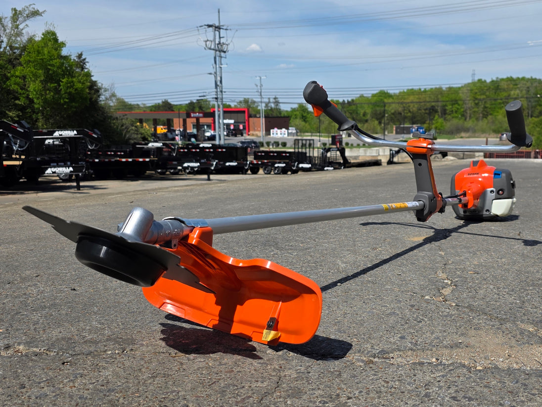 Husqvarna 525RX Commerical Brushcutter 25.4cc Engine Bike Handle Front right angle picture.