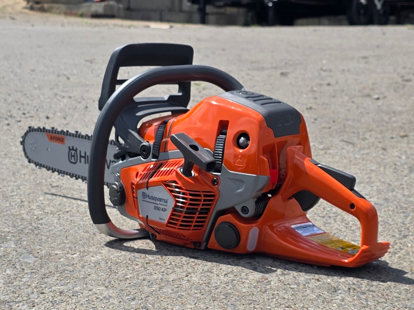Husqvarna 550XP II Gas-Powered 50.1cc X-Torq .050 Gauge 16" Chainsaw (Unboxed) Back left angle picture 