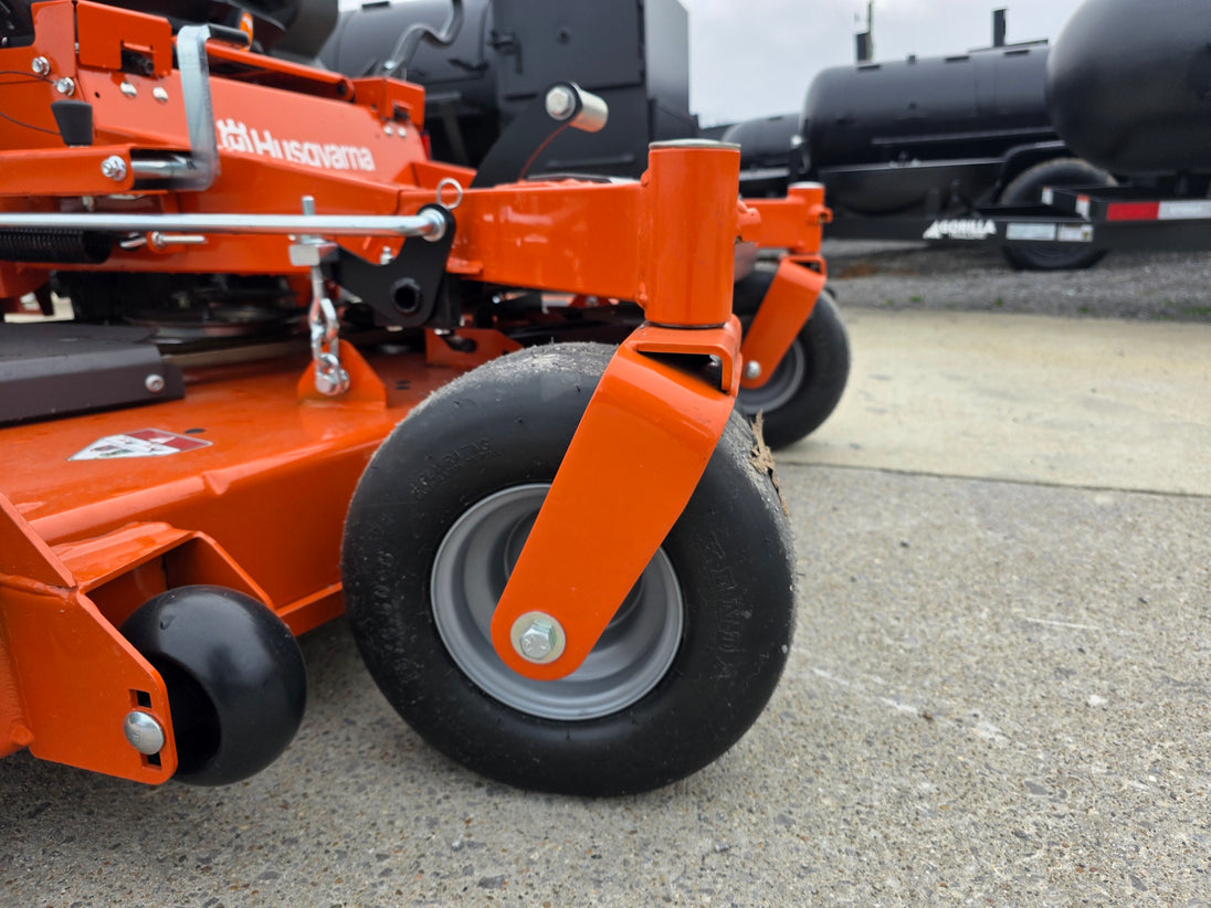 Husqvarna 60" Z460XS Zero Turn Mower 23.5HP KAW front wheel view picture 