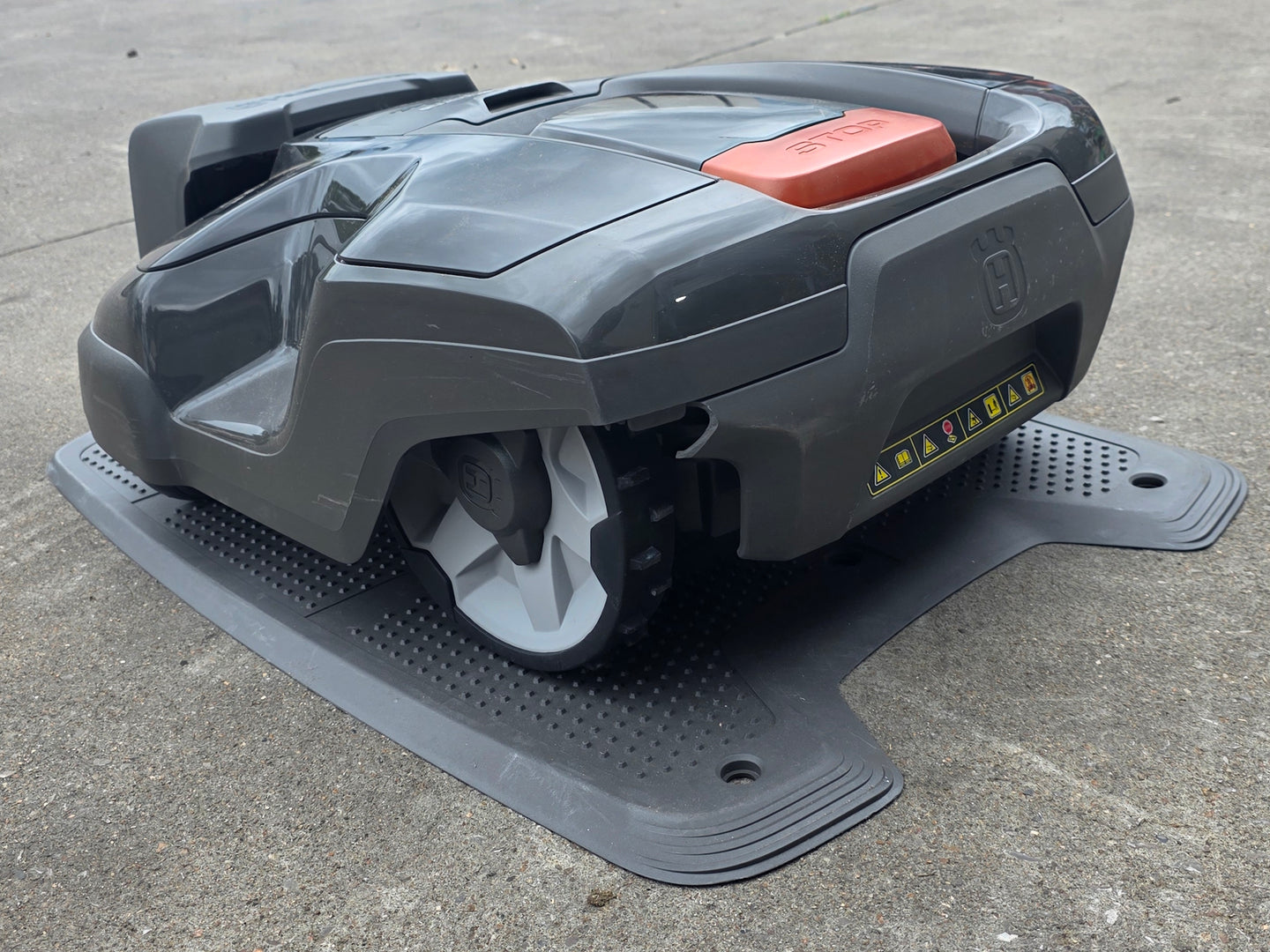 Husqvarna Automower® 310 Robotic Mower charging back left angle picture 