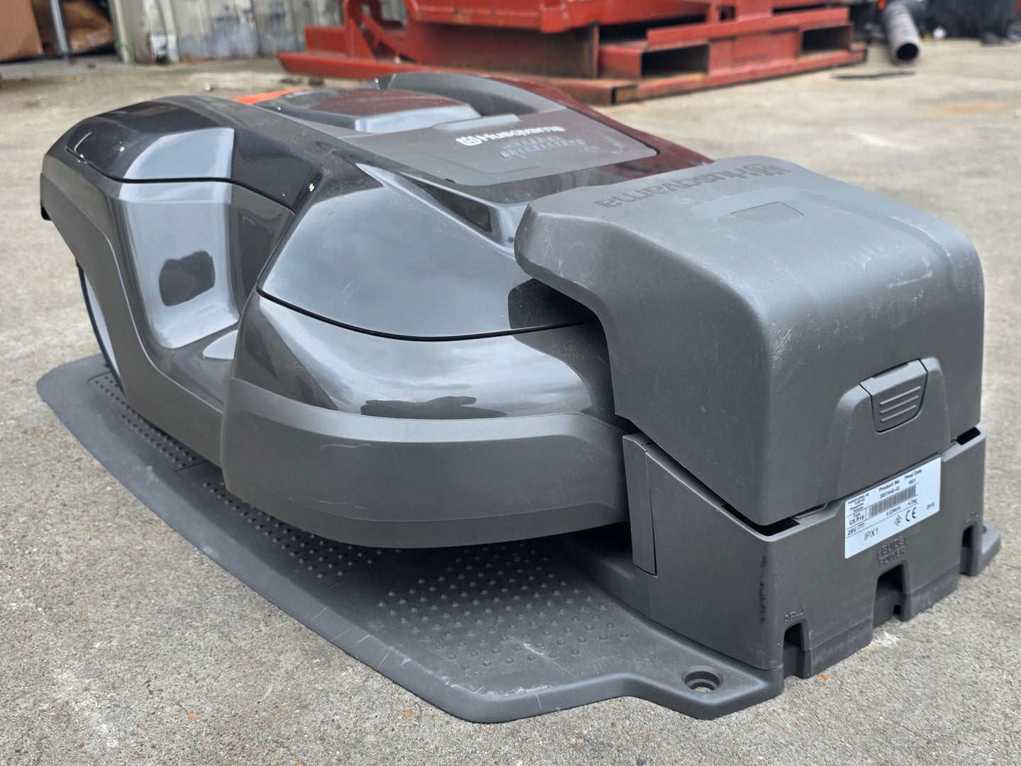 Husqvarna Automower® 310 Robotic Mower Charging front left angle picture 