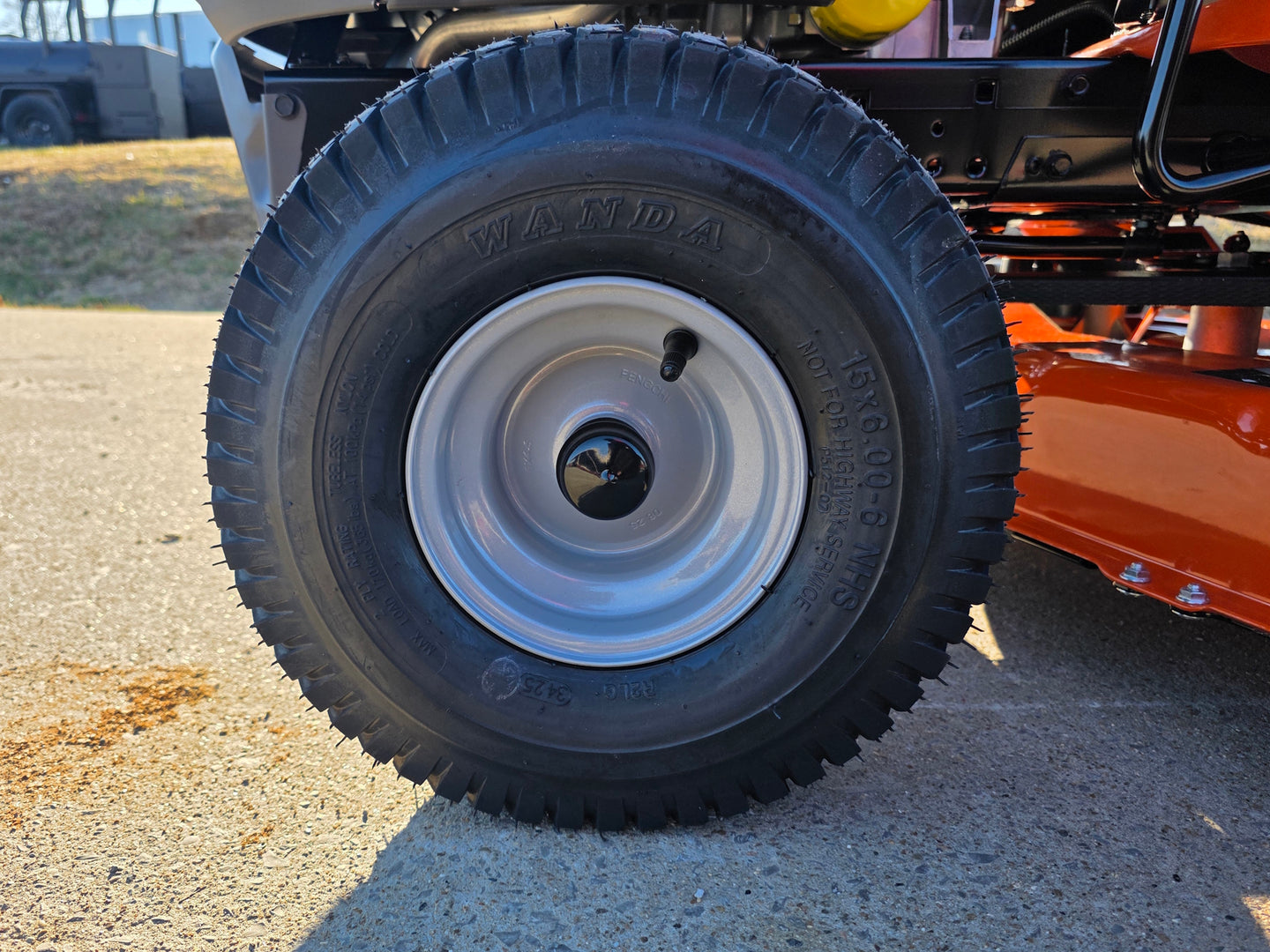 Husqvarna TS120 54" Garden Lawn Tractor – 24HP Briggs V-Twin Engine  front wheel view picture 
