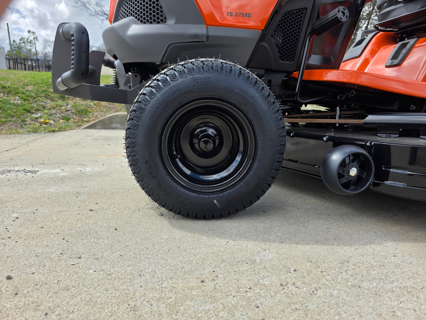 Husqvarna TS 375XD 54" Lawn Tractor – 24HP Kawasaki V-Twin Engine (Scratch & Dent) Front tire picture 