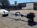 Shindaiwa T262X 25.4cc 2-Stroke Straight Shaft String Trimmer A Back left angle picture 