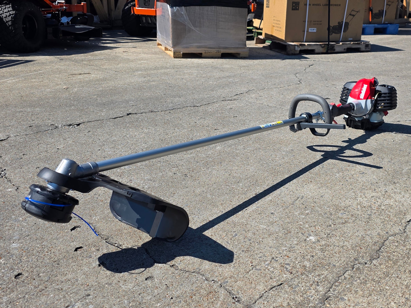 Shindaiwa T262X 25.4cc 2-Stroke Straight Shaft String Trimmer A Front right angle picture 