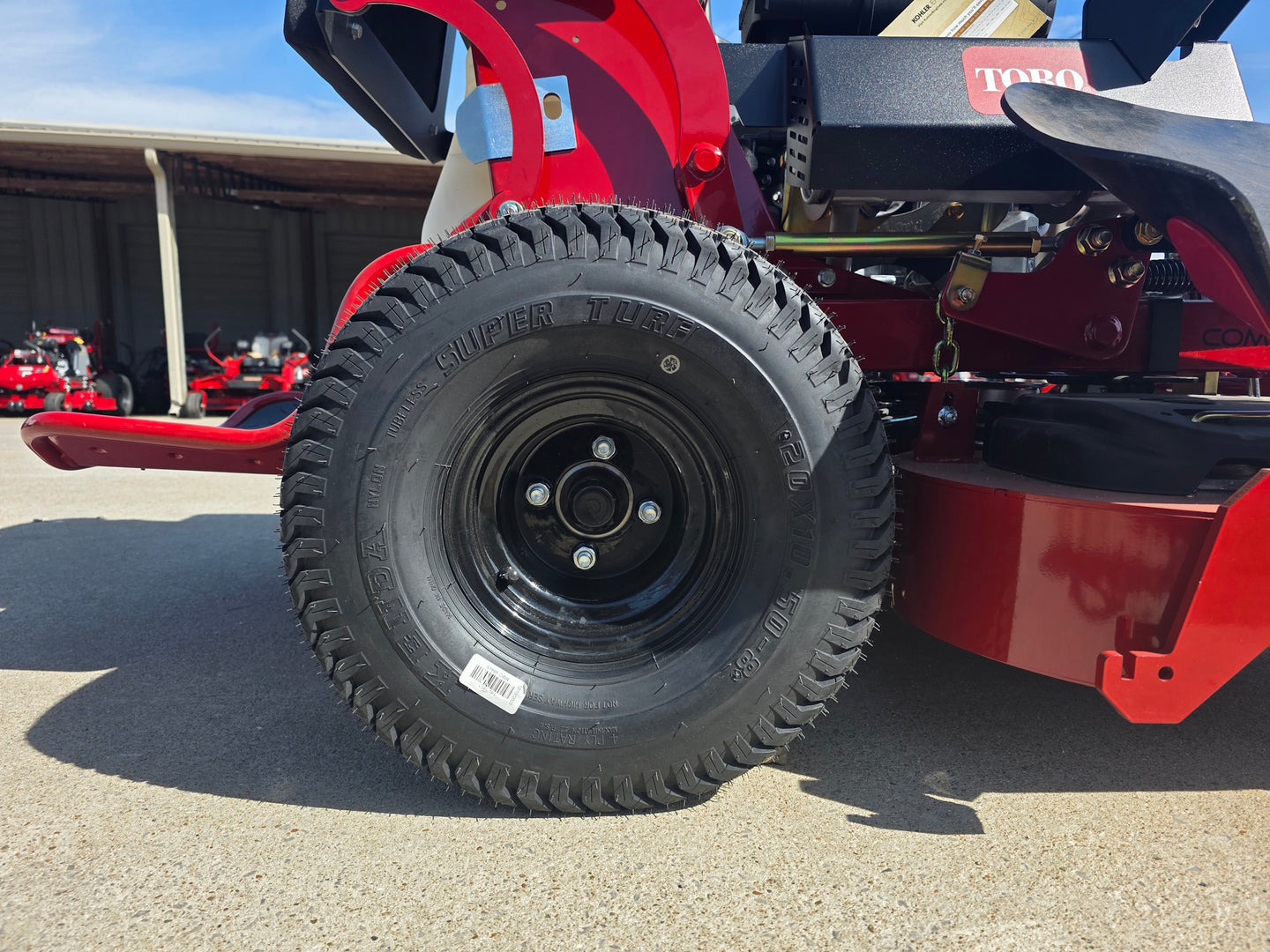 Toro 72530 52" GrandStand MultiForce Stand-On Mower 26.5HP KOH EFI back wheel view picture 
