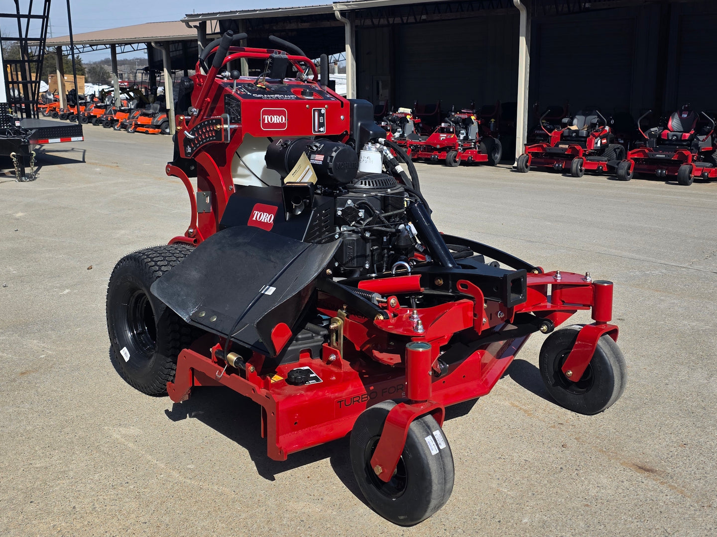 Toro 72530 52" GrandStand MultiForce Stand-On Mower 26.5HP KOH EFI front left angled view picture 
