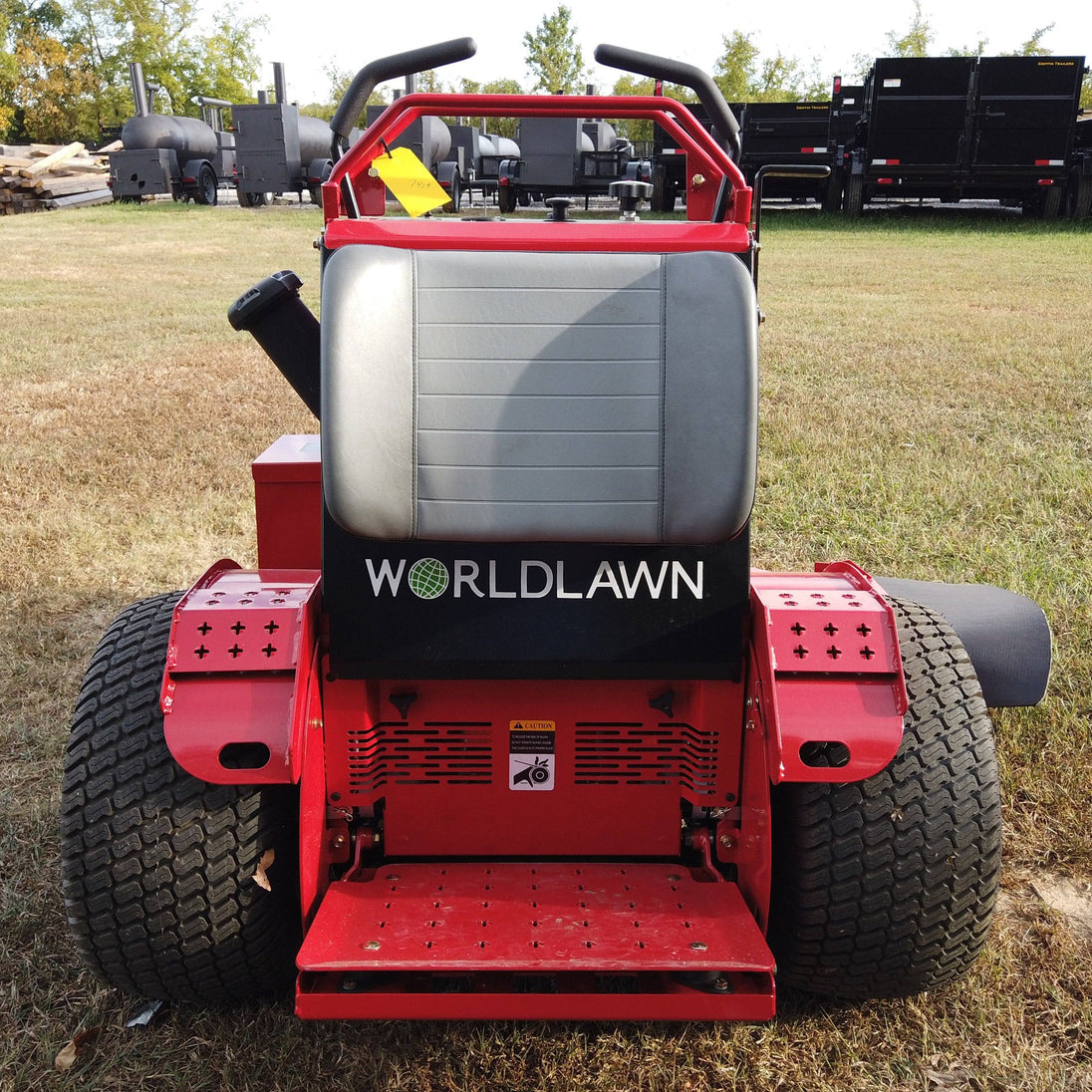 WorldLawn Venom Stand-On Walk Behind Mower Front Left - 36" Shown