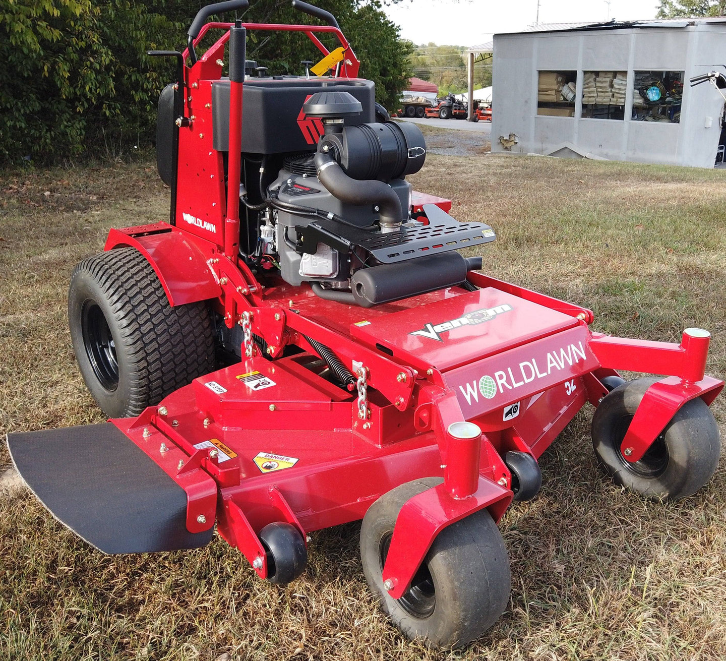 WorldLawn Venom Stand-On Walk Behind Mower Front Left - 36" Shown