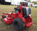 WorldLawn Venom Stand-On Walk Behind Mower Front Left - 36" Shown