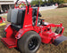 WorldLawn Venom Stand-On Walk Behind Mower Front Left - 36" Shown