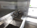 8.5' x 24' Black Porch Style BBQ Vending Trailer