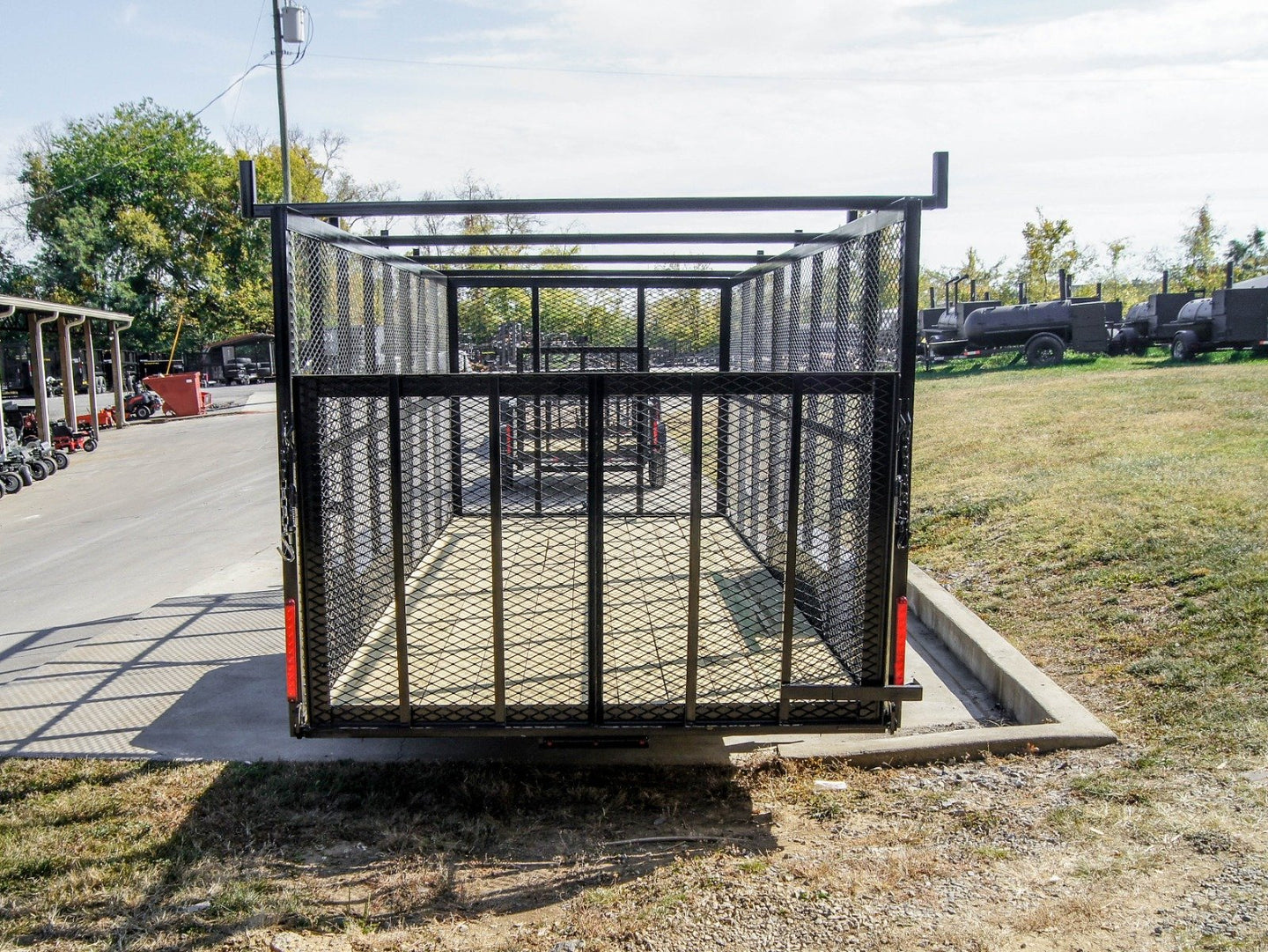 7x18 Tandem Straight Deck Utility Trailer with 6ft Mesh Sides and Ladder Racks