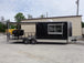 8.5' x 24' Black Porch Style Concession Trailer With Appliances