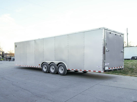 8.5 x 32 Silver Flat Nose Enclosed Trailer with (3) 7K Axles