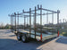 6.4x16 Straight Deck Tandem Utility Trailer 6ft Ladder Racks Side Angled View