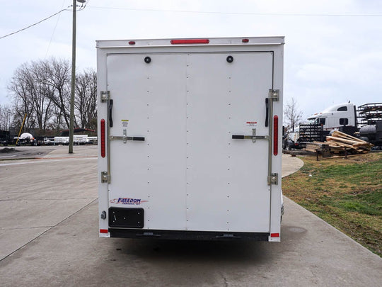 6'x12'  Enclosed V-Nose Trailer White Diamond Plate Floor Side Angle