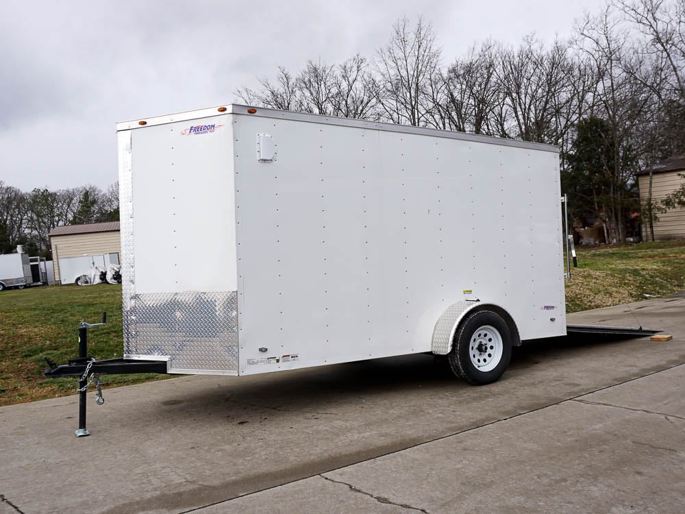 6'x12'  Enclosed V-Nose Trailer White Diamond Plate Floor Side Angle