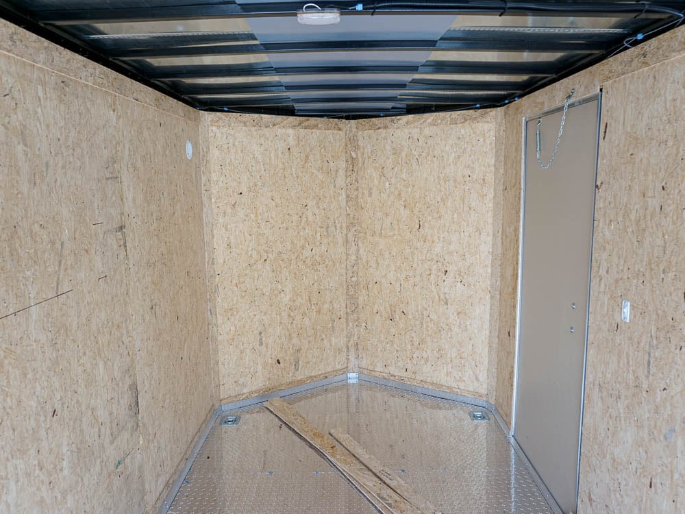 6'x12'  Enclosed V-Nose Trailer White Diamond Plate Floor Side Angle