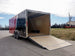 Enclosed Trailer 8.5'x22' Red & Black - Car Hauler Side Angle View