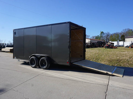 Enclosed Trailer 7x16 Charcoal V-Nose with Blackout Package Side Angle with Entry Door