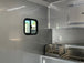 8.5' x 24' Black Porch Style Concession Food Trailer