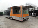 8.5' x 30' Black and Orange Porch Style Concession Food Trailer with Restroom