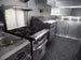 8.5' x 26' Black Porch Style Concession Food Trailer With Appliances