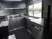 8.5' x 26' Black Porch Style Concession Food Trailer With Appliances